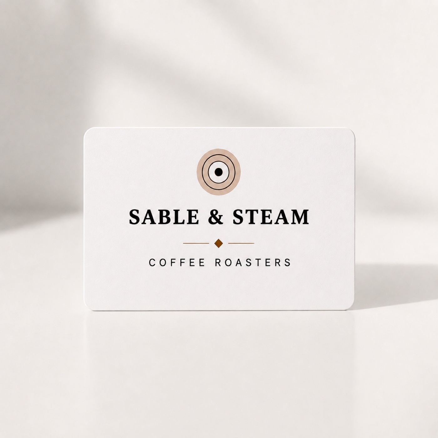White NFC tap card with a printed NFC target, brand name and tap-to-view instruction
